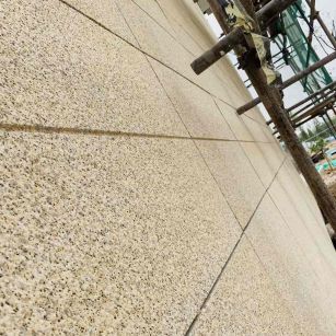 呼和浩特 黄金麻花岗岩荔枝面外墙干挂石材效果示例