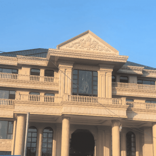 呼和浩特黄金麻别墅外墙干挂石材效果示例