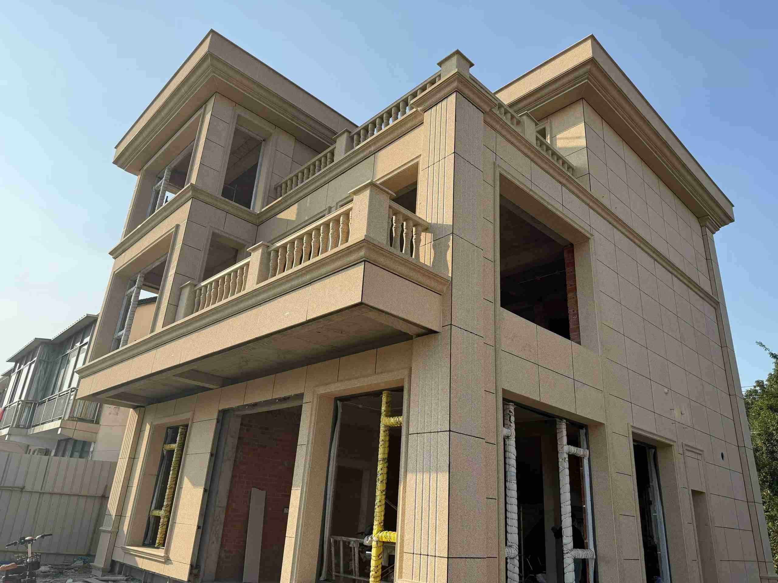 呼和浩特 黄金麻花岗岩石材荔枝面外墙干挂效果展示