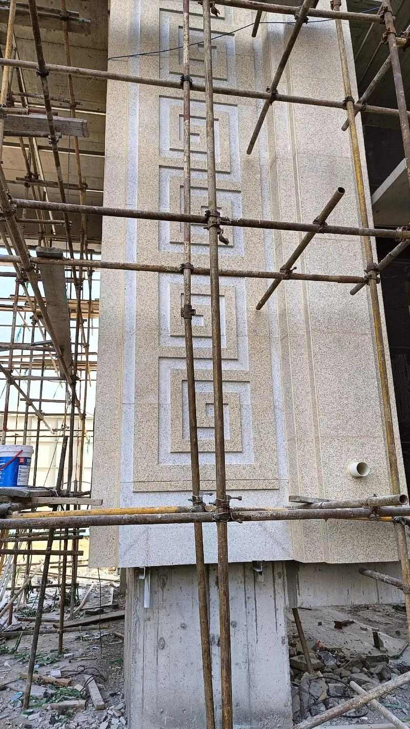 呼和浩特 黄金麻花岗岩别墅外墙干挂回纹造型效果